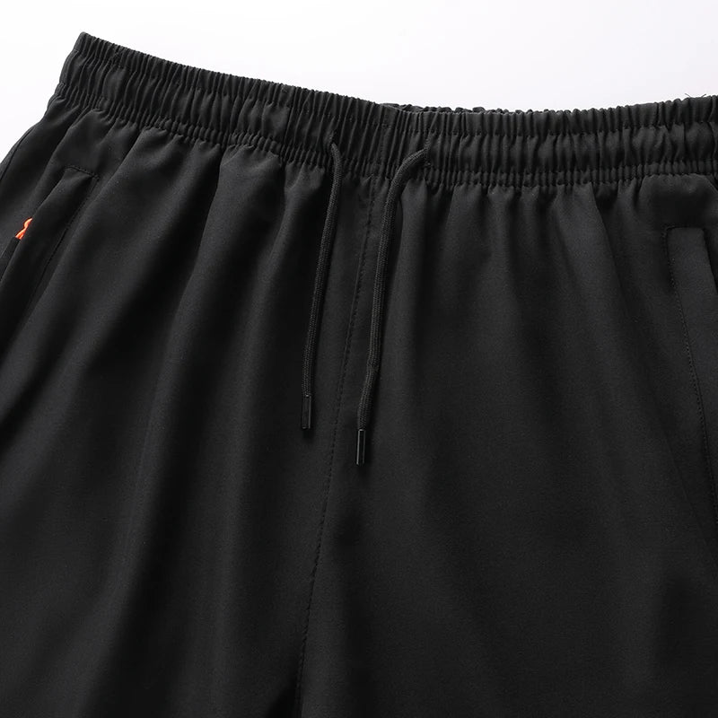 Shorts Masculinos Esportivos de Performance para Academia YJKVUR com Bolsos 2026 Novidade de Verão para Treino Corrida Jogger com Tamanhos Grandes M-8GG