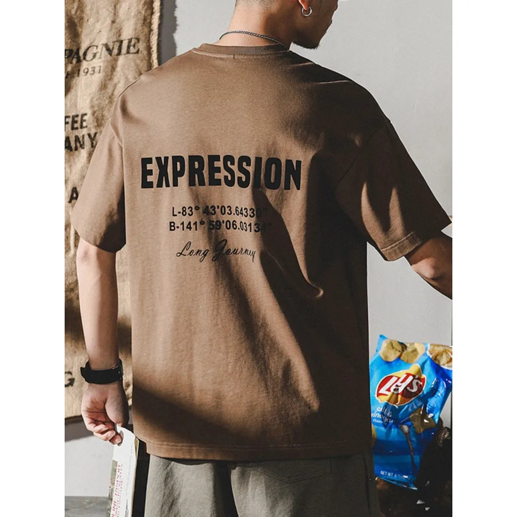 Camiseta Masculina Estampada com Letras Oversized Manga Curta Gola Redonda Solta Casual 2026 Verão Tops Masculinos Streetwear